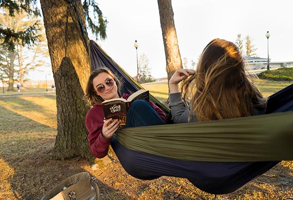 Image of Marist students reading in a hammock